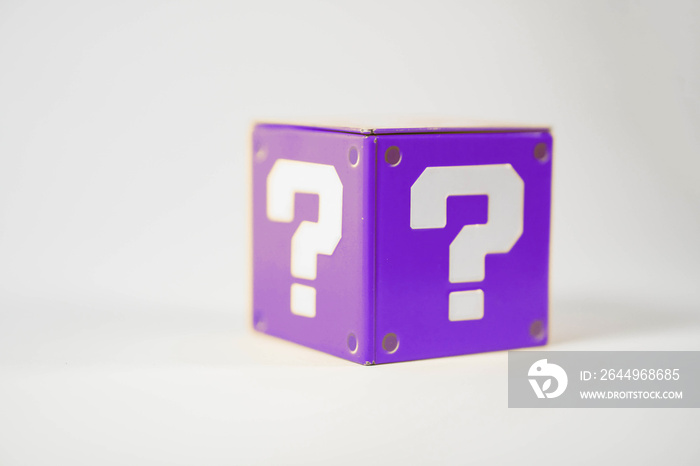 purple metal toy blocks with a question mark