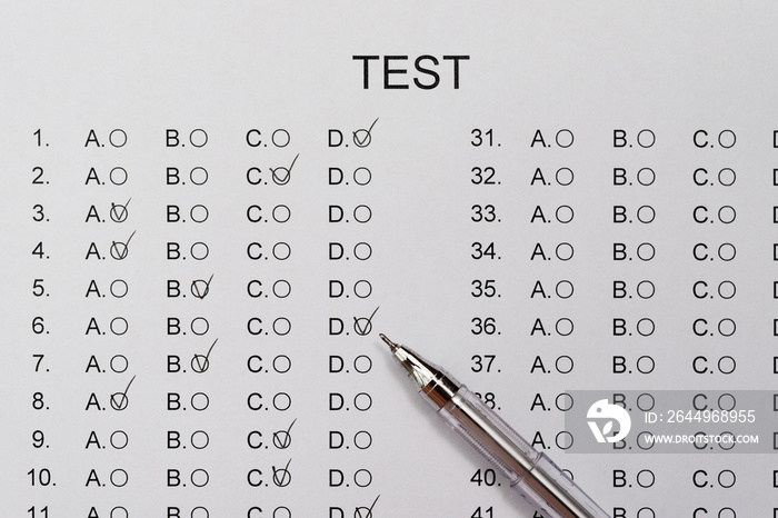 test score sheet with answers and ballpoint close up