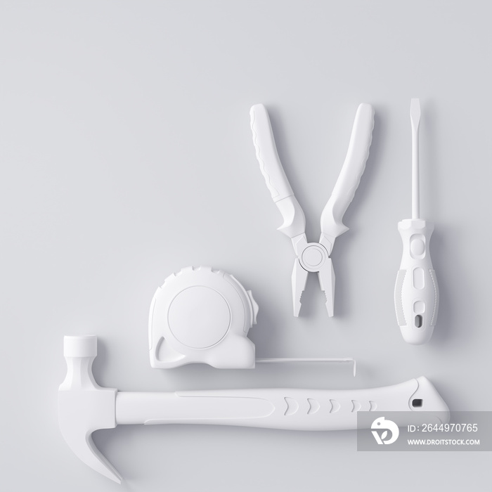 Top view of monochrome construction tools for repair and installation on white