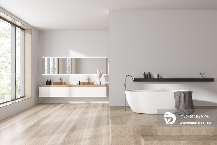 Cozy hotel bathroom interior with bathtub and sink. Mockup empty wall