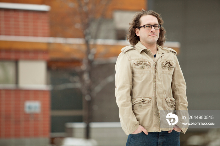 mid-adult man out for a walk in the city