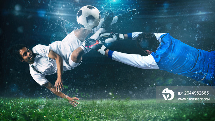 Soccer striker hits the ball with an acrobatic kick in the air at the stadium at night match