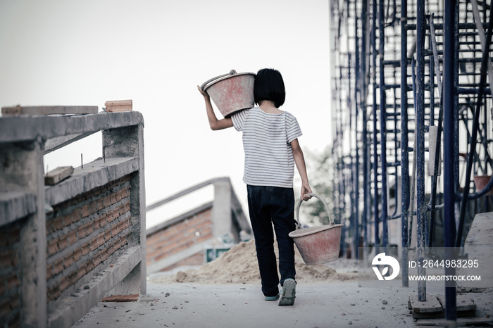 Children are forced to work in the construction area. Human rights concepts, stopping child abuse, violence, fear of child labor and human trafficking