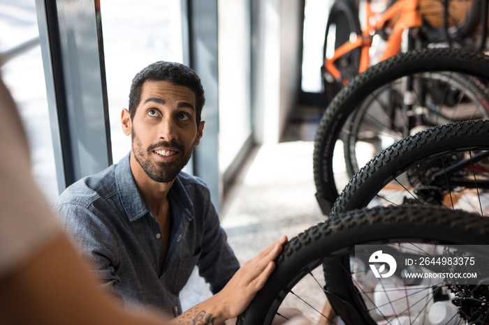 Man in a bicycle workshop