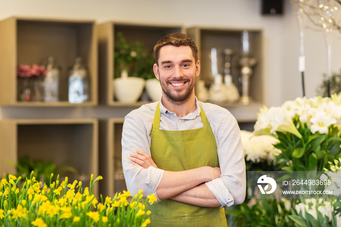 sale, small business and floristry concept - happy smiling florist man or seller at flower shop