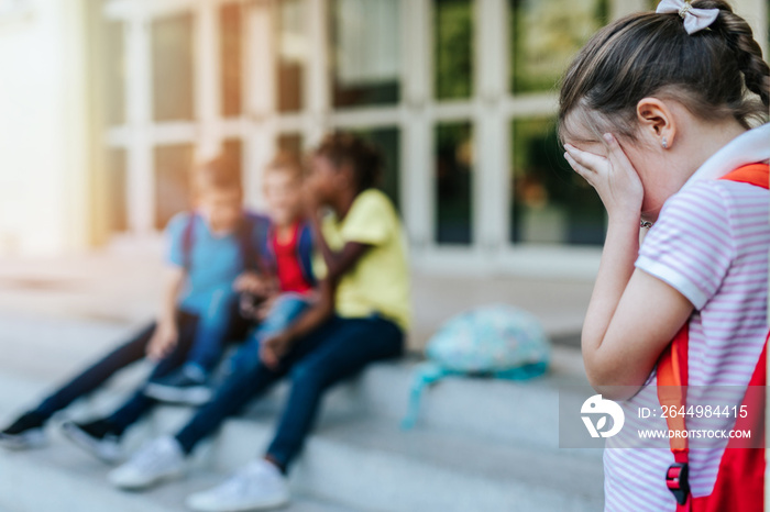 Schoolchildren isolation at primary school and bullying concept.