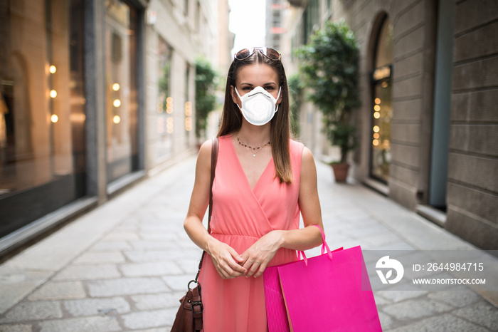 Masked woman shopping in Italy