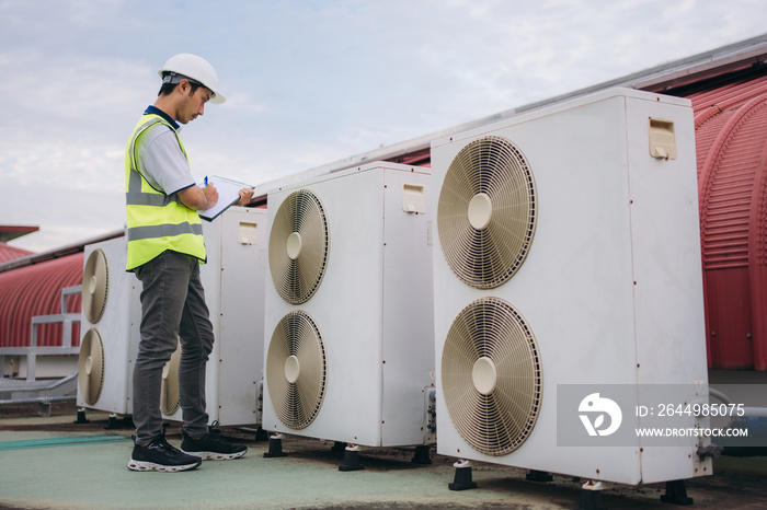 Engineers is checking the air conditioning cooling system of a major building or industrial facility.