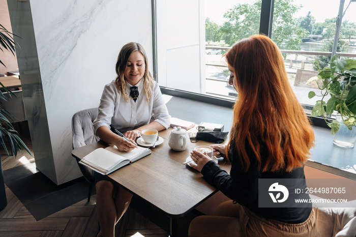 Mental health concept. Communication session of woman psychologist and client. Psychotherapy or talk therapy as help people with variety of mental illnesses and emotional difficulties