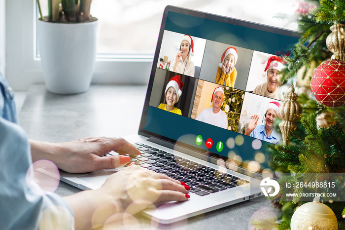 Attractive happy young girl student having video chat, waving. christmas