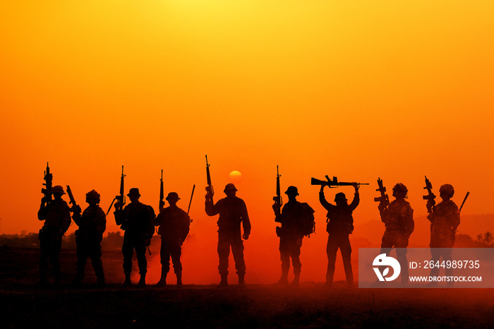 The silhouette of a military soldier with the sun as a Marine Corps for military operations