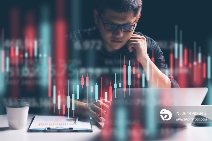 Businessman working in office, technical price chart and red and green candlestick chart indicator and computer screen background for stock trading, double exposure Traders analyze data.