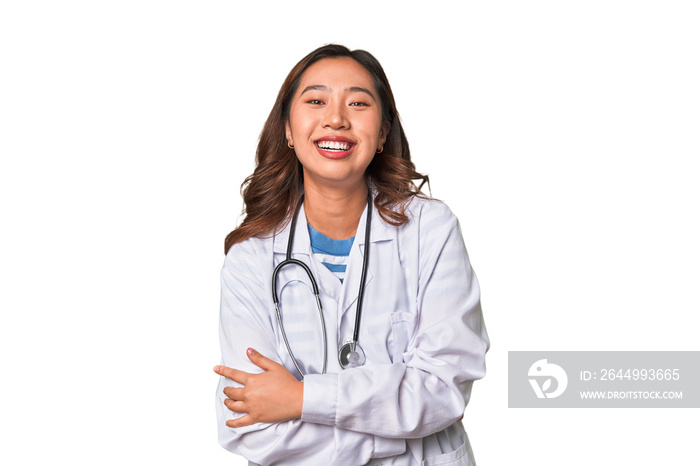 A young asian doctor woman laughing and having fun.