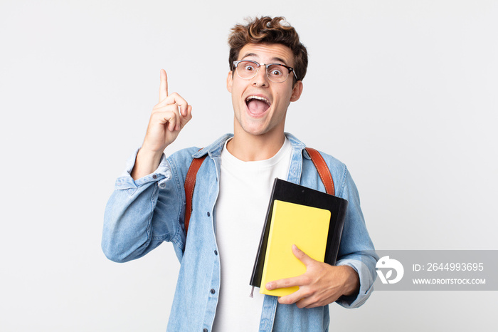 young handsome man feeling like a happy and excited genius after realizing an idea. university student concept