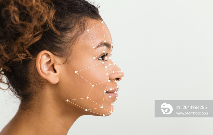 African American woman with scanning grid on her face against light background, panorama with blank space