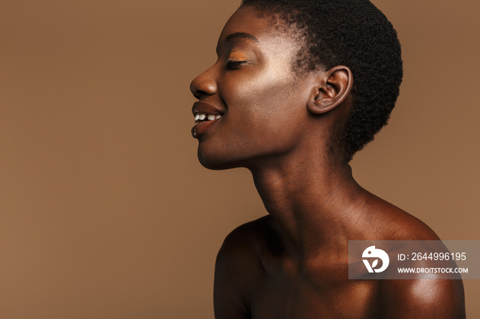 Beauty portrait of young half-naked african woman with short black hair