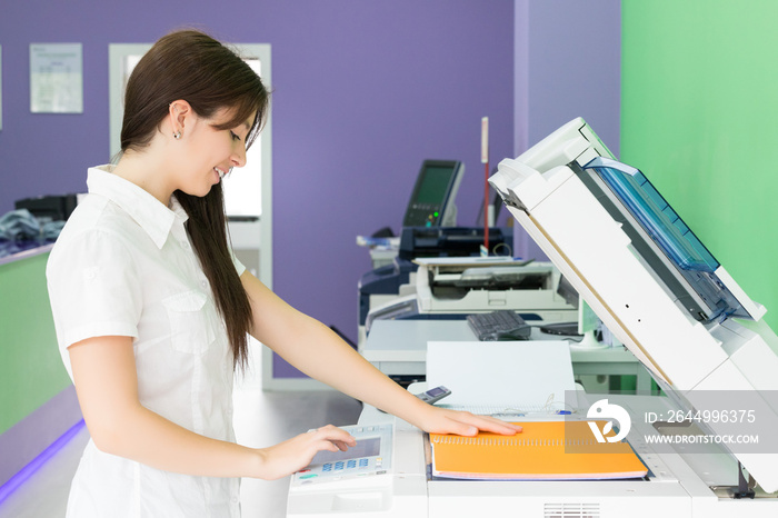 Young student at a copy center