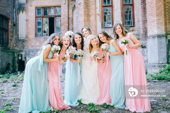 Beautiful bride with her pretty bridesmaids