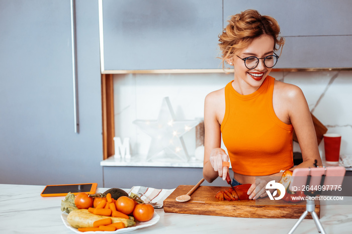 Joyful happy woman having online video stream