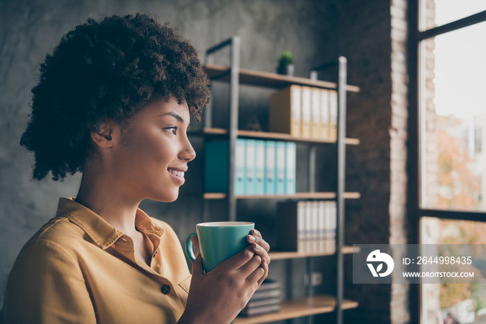 Close up profile side photo of dreamy afro american girl company rest relax hold hot espresso cup dream look window in office loft