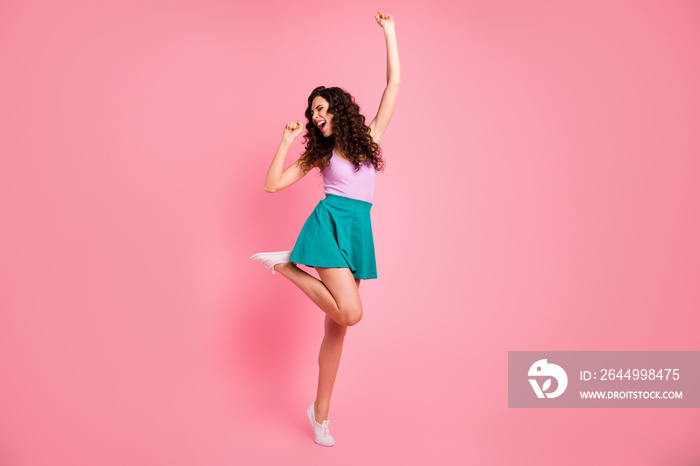 Full length body size photo of nice cute fascinating cheerful girl wearing singlet dancing while singing isolated with pink background