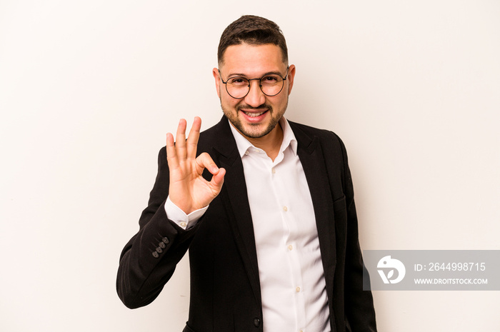 Business hispanic man isolated on white background cheerful and confident showing ok gesture.