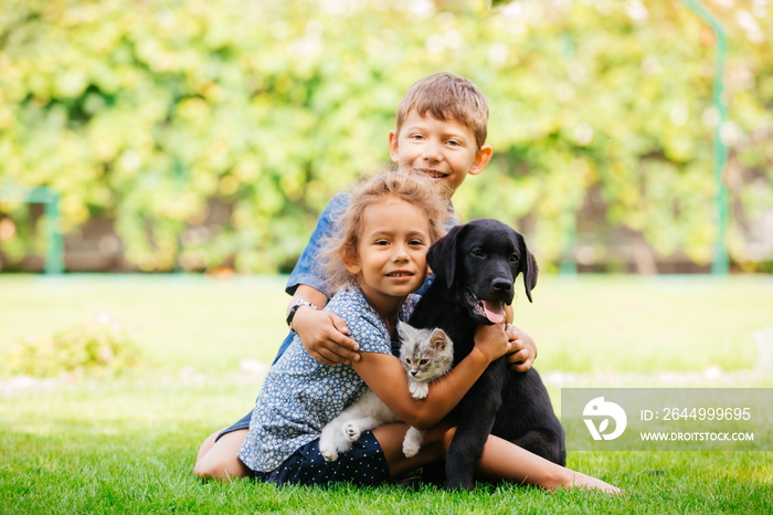 Children learning to be caring and loving pet owners