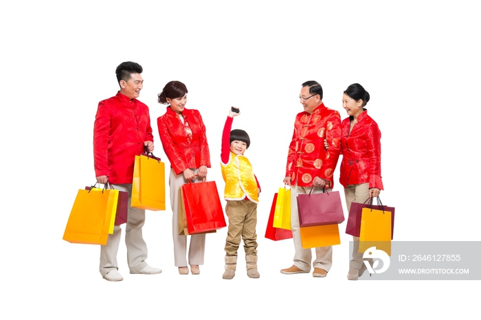 棚拍中国新年快乐的唐装家庭购物