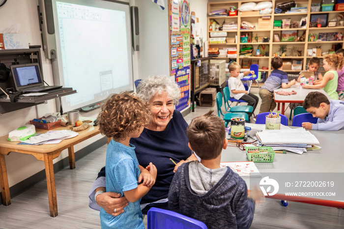 Teacher and children in a classroom