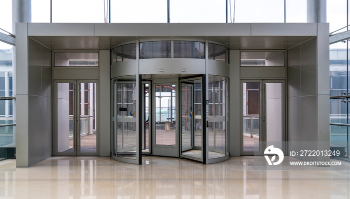 Rotating glass doors at entrances and exits of shopping malls..