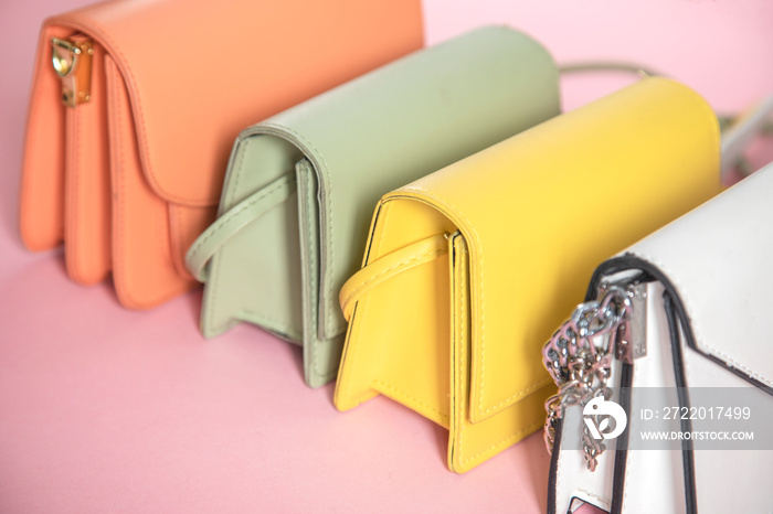 color handbags on the pink background