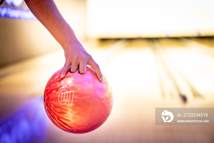 hand holding a bowling ball