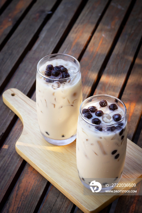 Bubble milk tea in glass. Trendy beverage in Asia. Sweet drink with tapioca.