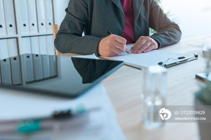 Businesswoman signing contract agreement