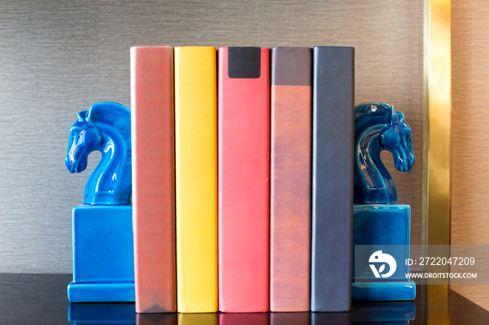 elegant book ends on table in modern study