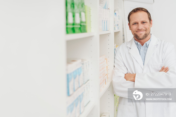 Confident male pharmacist with a lovely smile