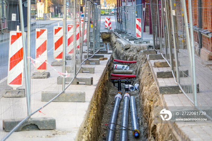 replacement of underground district heating pipes on city street