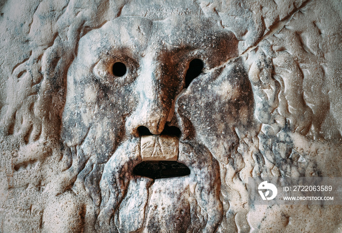 Mouth of Truth ( Bocca della Verita) marble mask in the Santa Maria in Cosmedin  basilica church in 