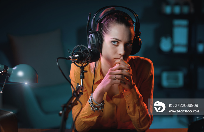 Charming radio host in the studio