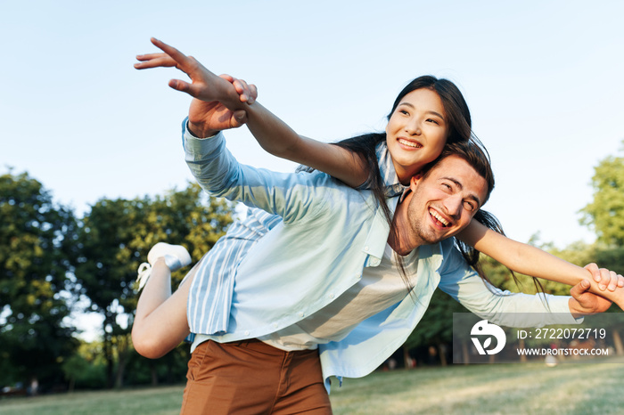 happy couple having fun in the park