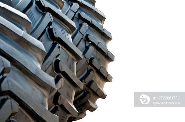 Stack of brand new tractor tires, isolated.