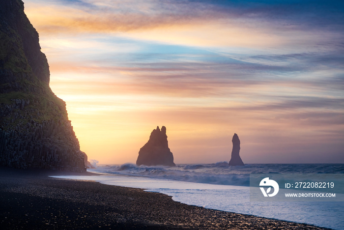 Reynisfjara black sand beach in sothern Iceland, Vik region, facing Reynisdrangar basalt rock format