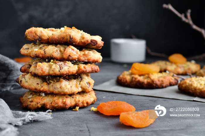 Oatmeal cookies. Homemade baking. Autumn concept of cookies with dried apricots and chocolate. Copy 