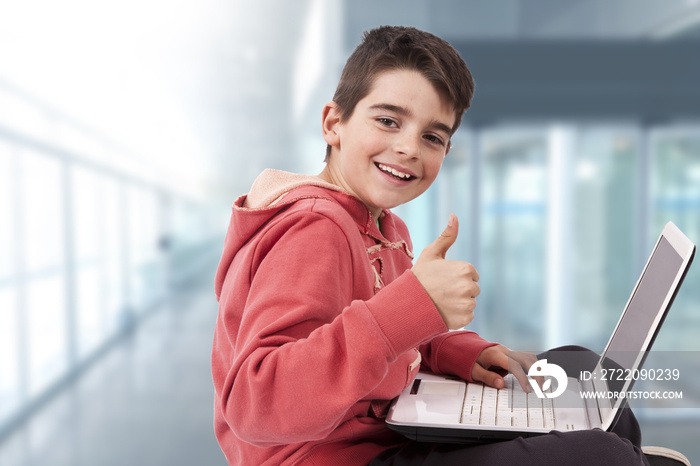 child with laptop computer