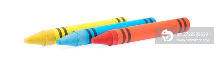 yellow, blue, and red crayon isolated on white background