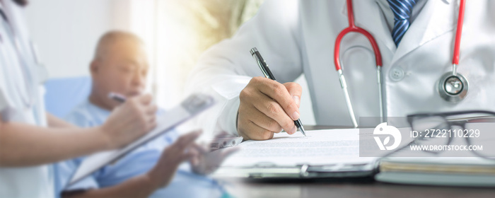 Close up hand of doctor writing and filling up on paper to treatment after checking and history talking with patient