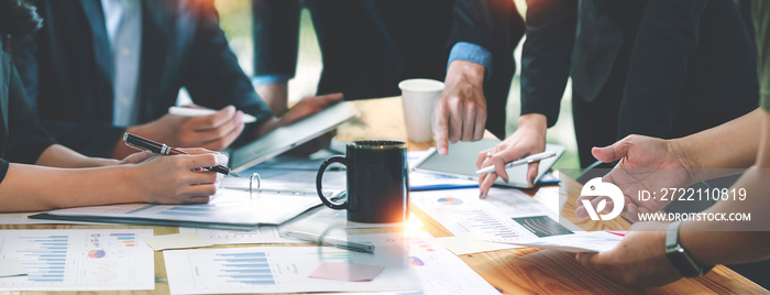 Cropped shot of diverse coworkers working together in boardroom, brainstorming, discussing and analyzing business strategy.