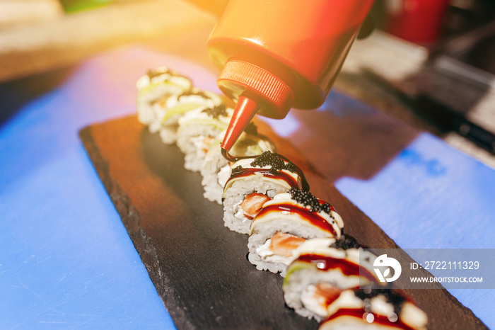 Japanese chef in restaurant cook sushi