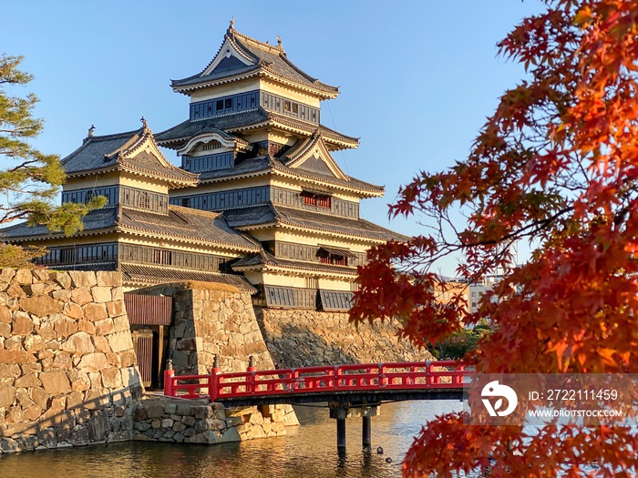 Title Matsumoto Castle with maple leaves in autumn in Nagano, Japan