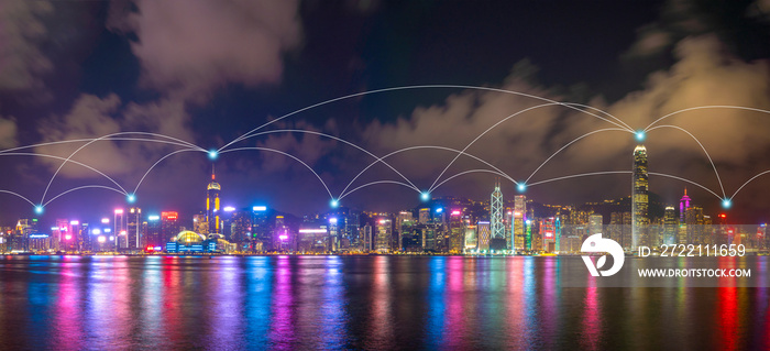 Digital network connection lines of high-rise office buildings, skyscrapers, architectures in financial district. Smart urban city for business and technology concept in Downtown Hong Kong skyline.